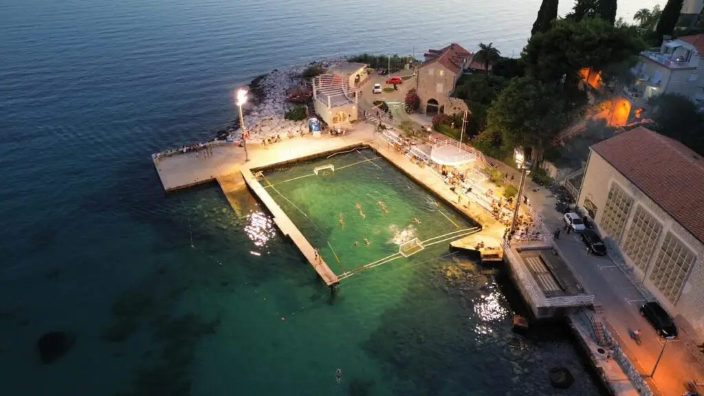 The sea pool at Mlini lit up at dusk